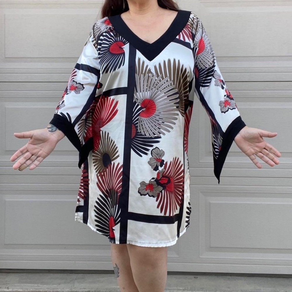 Beautiful satin dress with dramatic bell type dres mod